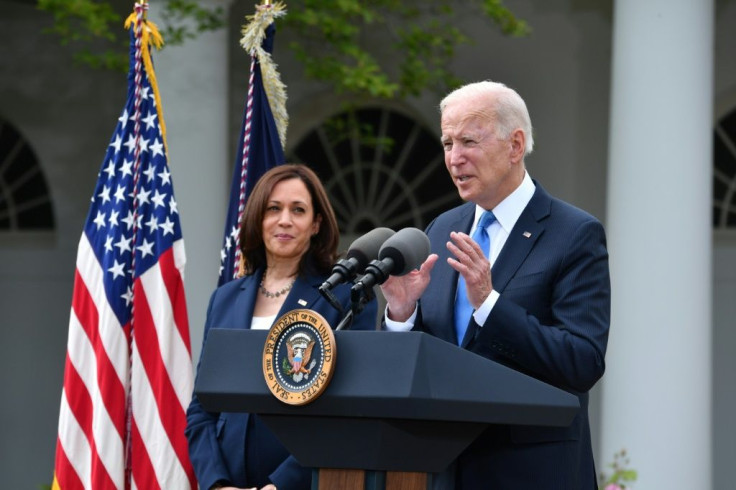 Joe Biden and Kamala Harris went mask-free after the Centers for Disease Control and Prevention said vaccinated people would no longer need to wear one, providing a psychological boost on the road to normalityUS Vice President Kamala Harris looks on as 