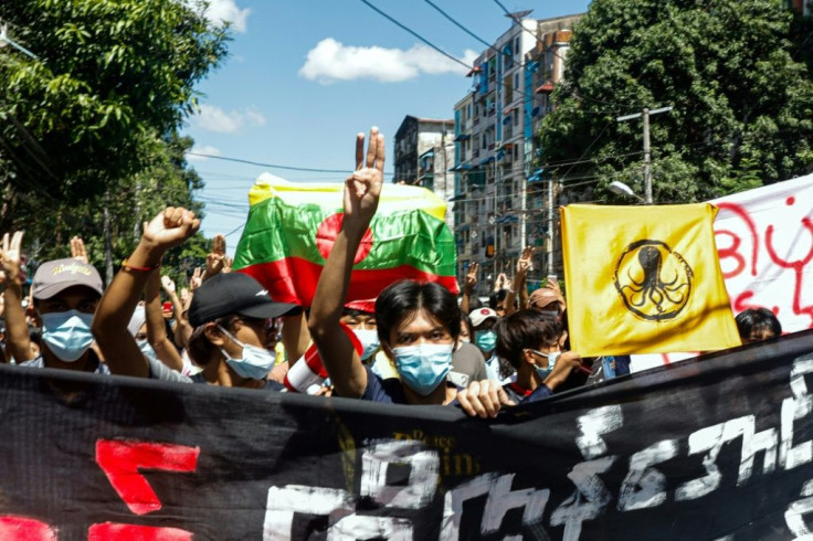 Myanmar protestors in Yangon demonstrate against the coup. Dozens of reporters have been detained under the junta's crackdown