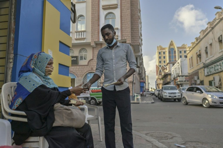 Trade in Djibouti's capital would go much less smoothly without the 'sarifley' money changers