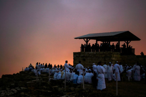 Samaritan worshipers gather at dawn on top of Mount Gerizim near the northern West Bank city of Nablus during celebrations of Shavuot 