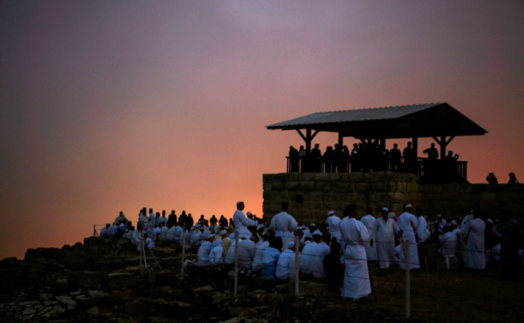 Samaritan worshipers gather at dawn on top of Mount Gerizim near the northern West Bank city of Nablus during celebrations of Shavuot