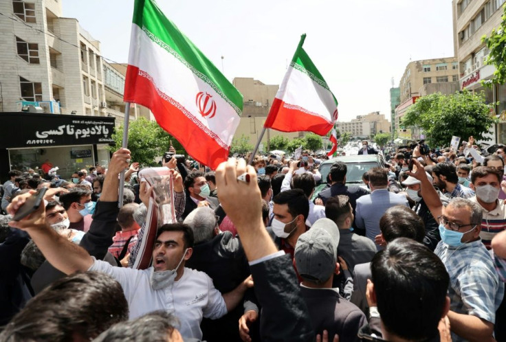 Supporters of Ahmadinejad rallied outside when the former president registered to run again on May 12, 2021