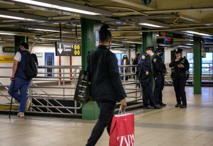 Police officers patrol New York's Union Square subway station on May 10, 2021