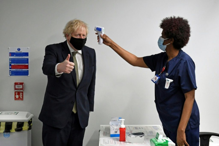 Prime Minister Boris Johnson (L) promised more resources for the health service after himself contracting Covid-19