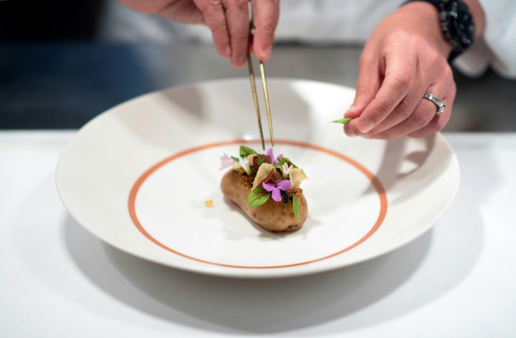 A signature dish is "potato and roe", which is a potato topped with herring and trout roe, served with a beurre blanc sauce