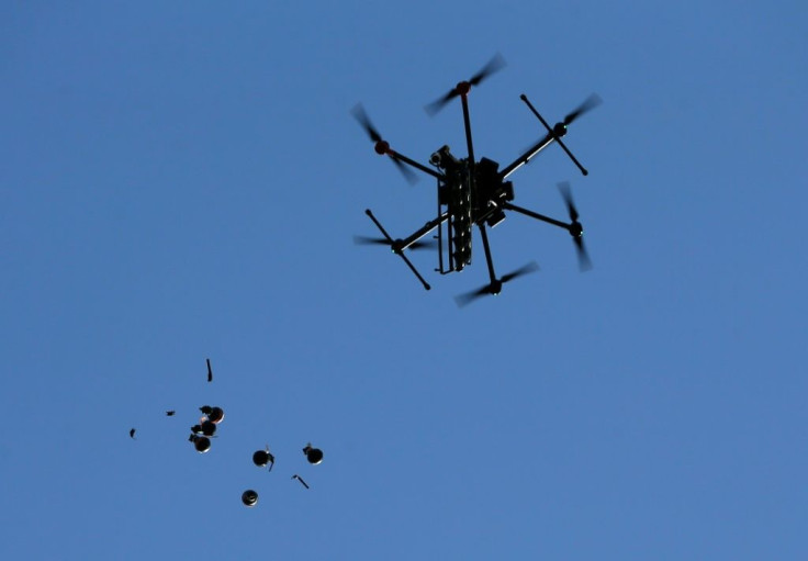 An Israeli drone releases stun grenades on Palestinians demonstrating against the latest tensions in Jerusalem and the occupied West Bank as well as the bombing of the Gaza Strip by Israel