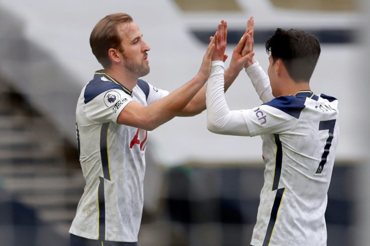 Earning his Spurs, again - Harry Kane (L) celebrates with Son Heung-min  after scoring the opening goal against Wolves