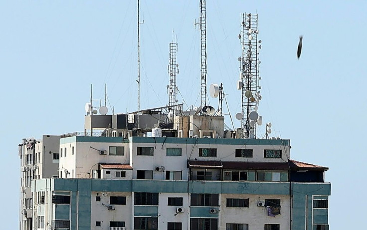 An air bomb hits the Jala Tower during an Israeli airstrike in Gaza City, which is controlled by the Palestinian Hamas movement, on May 15
