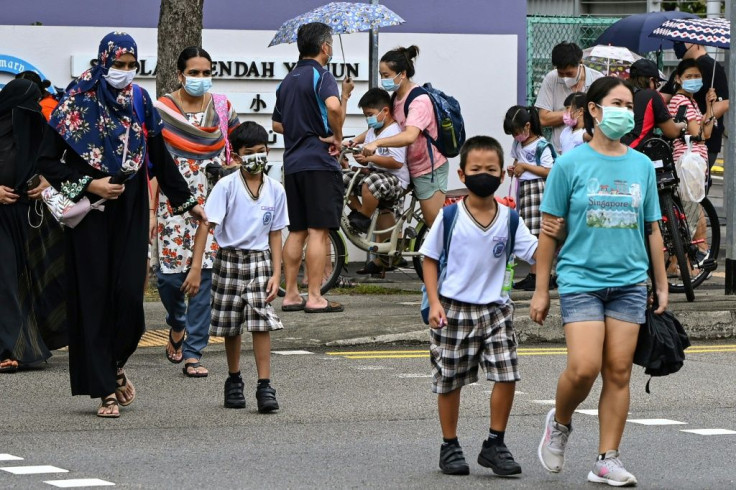 Singapore authorities warned new coronavirus strains were affecting more children in the city-state