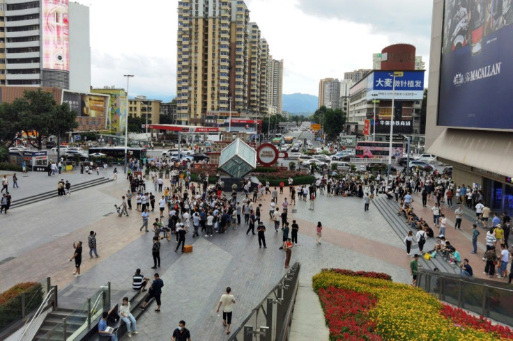 Bystander videos published by local media on Weibo showed the skyscraper shaking on its foundations as hundreds of terrified pedestrians ran away outside