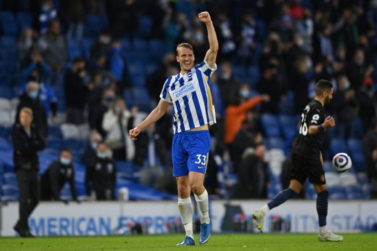 Brighton's Dan Burn celebrates against Manchester City