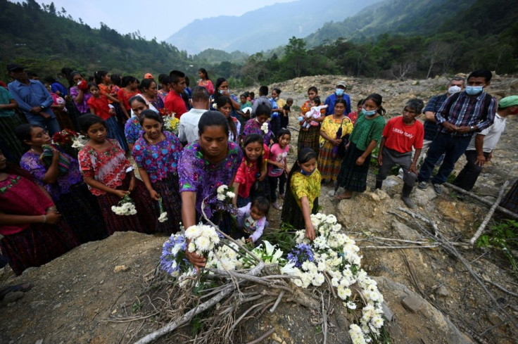 Some 51 people were buried by the mudslides that devastated Queja in Guatemala, turning it into a cemetery