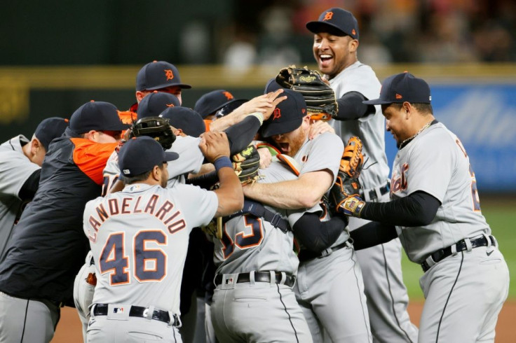 Detroit Tigers pitcher Spencer Turnbull is mobbed by teammates after throwing the seventh no-hitter of the Major League Baseball season on Tuesday in a victory over the Seattle Mariners