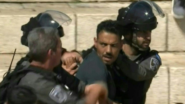 IMAGESIsraeli forces fire stun grenades to disperse protestors gathering in solidarity with the Gaza Strip at Damascus Gate in the Old City of Jerusalem.