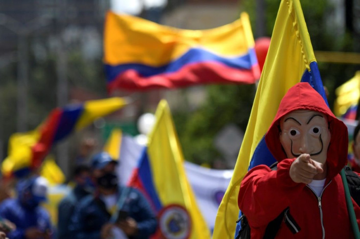 Colombian protesters, such as these in Bogota on May 19, 2021, are demanding a stop to police violence and more broadly a better life