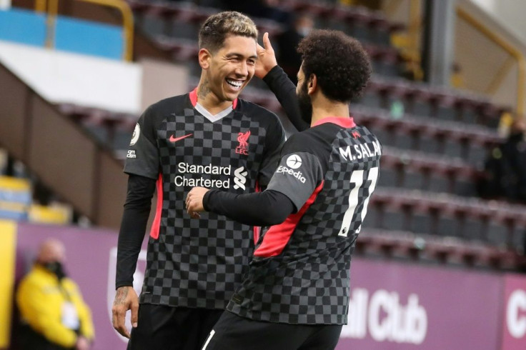 Liverpool's Roberto Firmino (L) celebrates scoring at Burnley