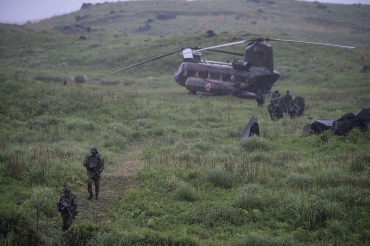 Japanese Self-Defense Force soldiers take part in an exercise with French and US forces. Defence Minister Nobuo Kishi warned the gap between Japan and China's military was 'growing by the year'
