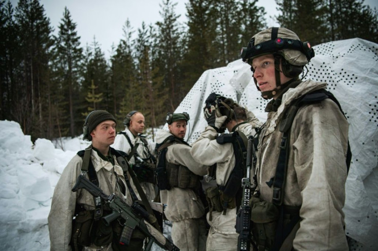 Swedish soldiers plan their operations as they take part in the annual "Winter Sun" excercise