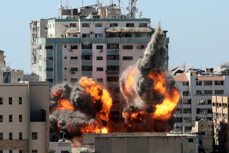 The owner of Gaza City's Jala Tower says the Israelis warned him he had one hour to evacuate the building before it was flattened in an air strike