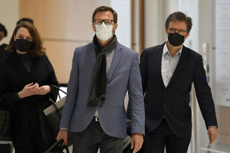 Jerome Lavrilleux (centre), Sarkozy's former deputy campaign manager, arriving at court