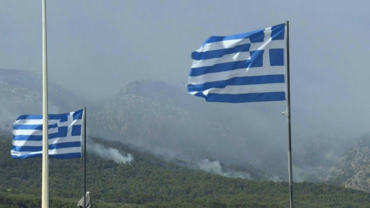 IMAGES Scores of Greek villagers are evacuated after a forest fire raged overnight around the protected wildlife habitat of Mount Geraneia with no injuries immediately reported.