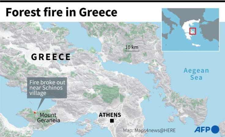 Map of Greece locating the area where a forest fire started near the village of Schinos, prompting evacuations.