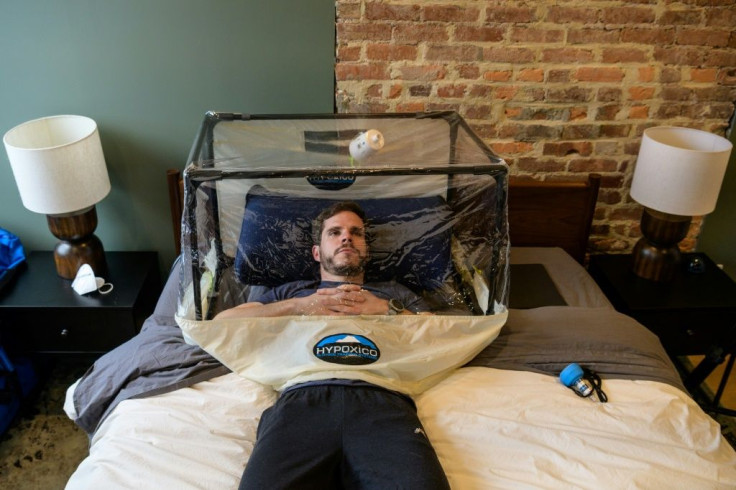 Mountaineer Francisco Martin is seen in a low-oxygen tent that mimics thin air at high altitude