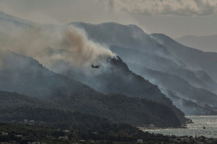 A large forest blaze is burning for a second day on the Geraneia mountain range in Greece