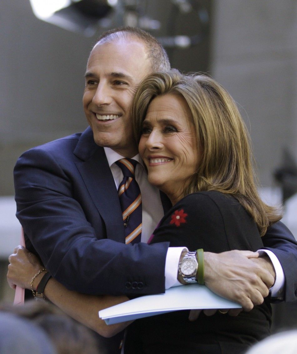 Hosts of NBC039s quotTodayquot show Matt Lauer L and Meredith Vieira embrace during the show in New York June 3, 2011.