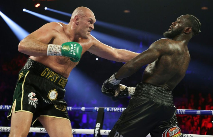 Tyson Fury punches Deontay Wilder during their heavyweight bout for Wilder's WBC belt in February 2020 at MGM Grand Garden Arena in Las Vegas, Nevada