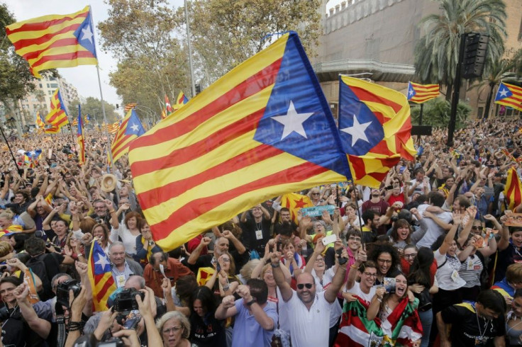 People celebrating after Catalonia's parliament voted to declare independence from Spain in 2017