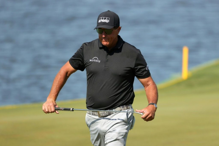Five-time major winner Phil Mickelson shared the lead with South African Louis Oosthuizen after 36 holes at the PGA Championship