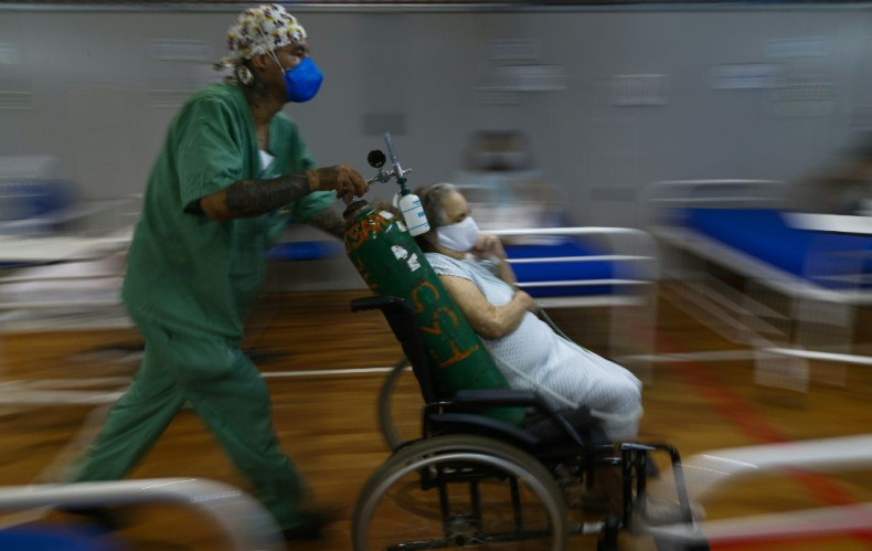 A Covid-19 patient is treated in a hospital set up at a sports gym, in Santo Andre, Sao Paulo state, Brazil in March 2021