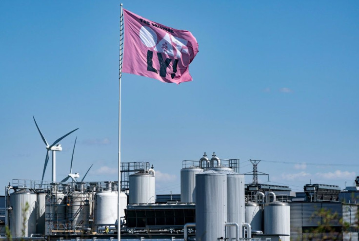 A flag flies over the Swedish oat milk producer Oatly factory in Landskrona, Sweden on May 20, 2021The Oatly IPO priced late Wednesday at the high end of its expected range ahead of the vegan dairy company's trading debut, as alternative milk products,
