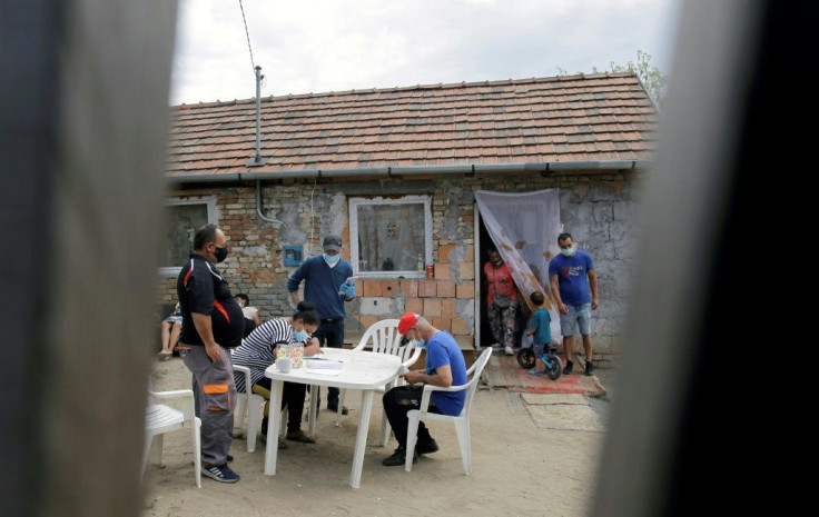 In many Roma settlements, residents have no public utilities, even water, and are forced to share communal facilities