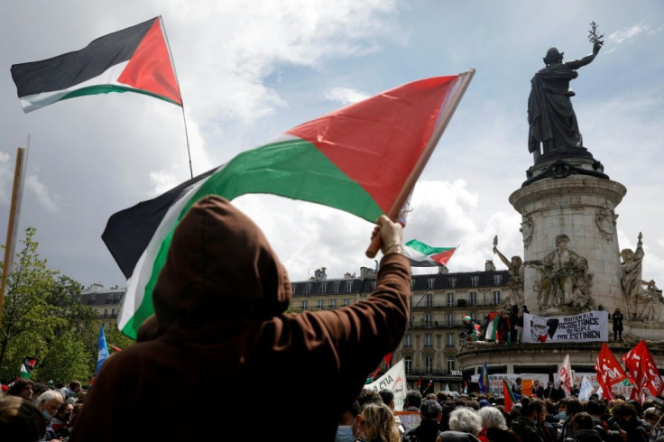 In Paris protesters waved Palestinian flags and shouted slogans such as "Palestinians will live"