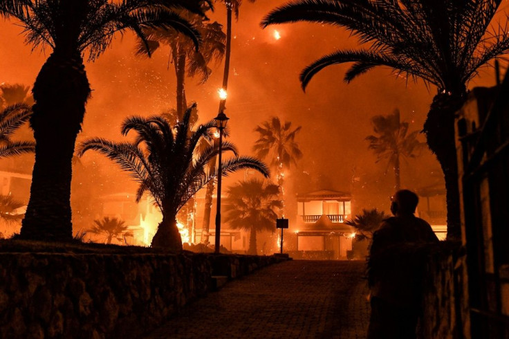 The blaze started late on Wednesday near the village of Schinos