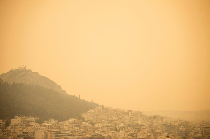 Smoke from the fire choked Athens with ash falling from the sky