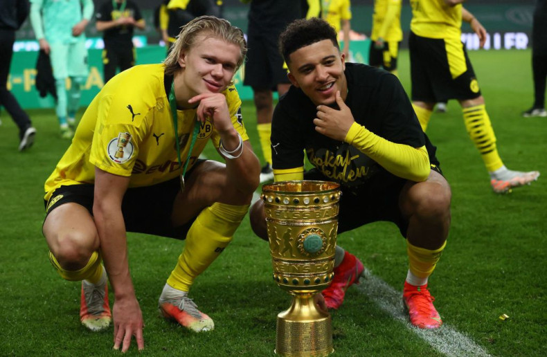 Dortmund's Norwegian forward Erling Braut Haaland (L) and Dortmund's English midfielder Jadon Sancho 