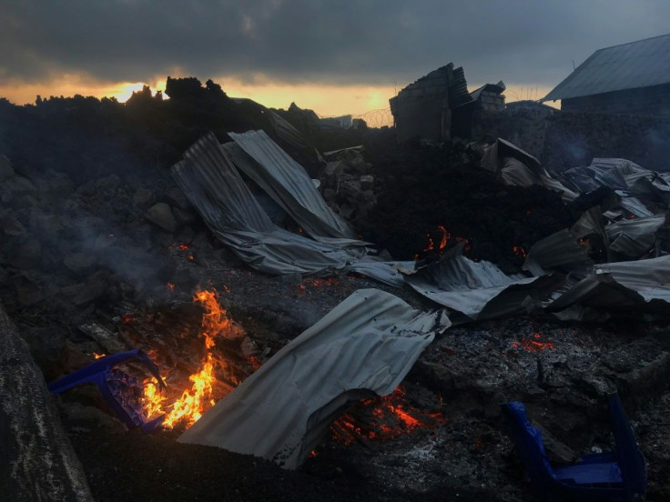 Thousands had fled during the night and many families slept on pavements surrounded by their belongings