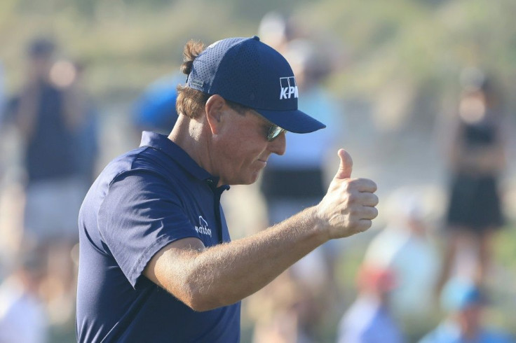 Phil Mickelson gives a thumbs-up on the way to his historic victory in the 2021 PGA Championship