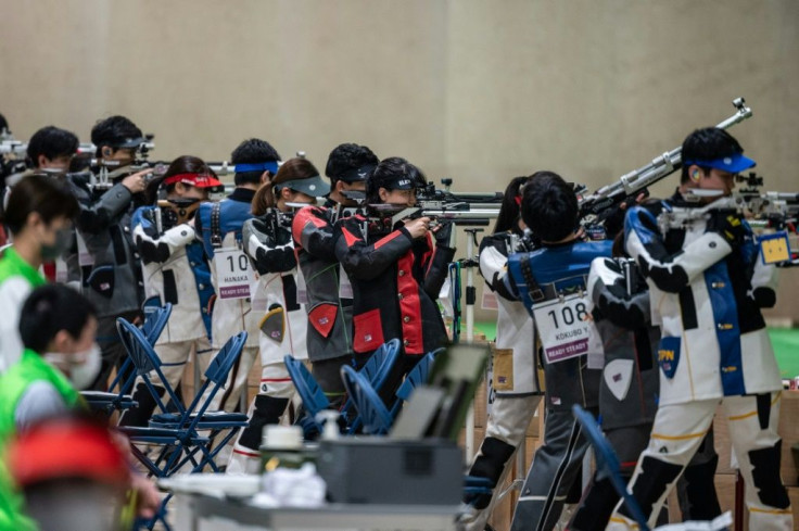 Athletes at a shooting test event for the Tokyo Olympics at Asaka shooting range