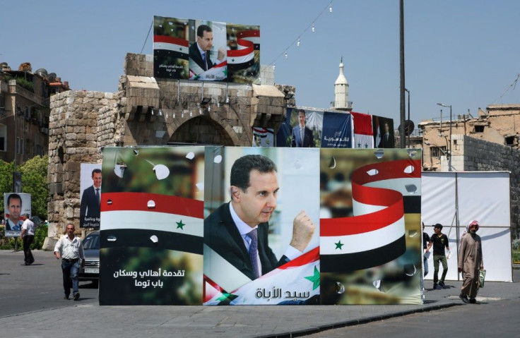 In the capital Damascus, Syrian President Bashar al-Assad's portraits line roads and inundate main squares, outnumbering those of his two little-known challengers