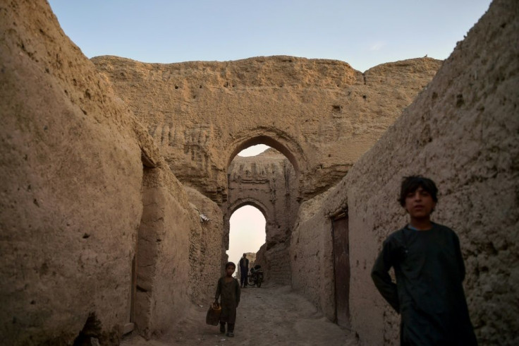 Among the ancient towers, doors and windows have been added and crumbling walls coated with a clay and straw mixture to strengthen them and plug gaps