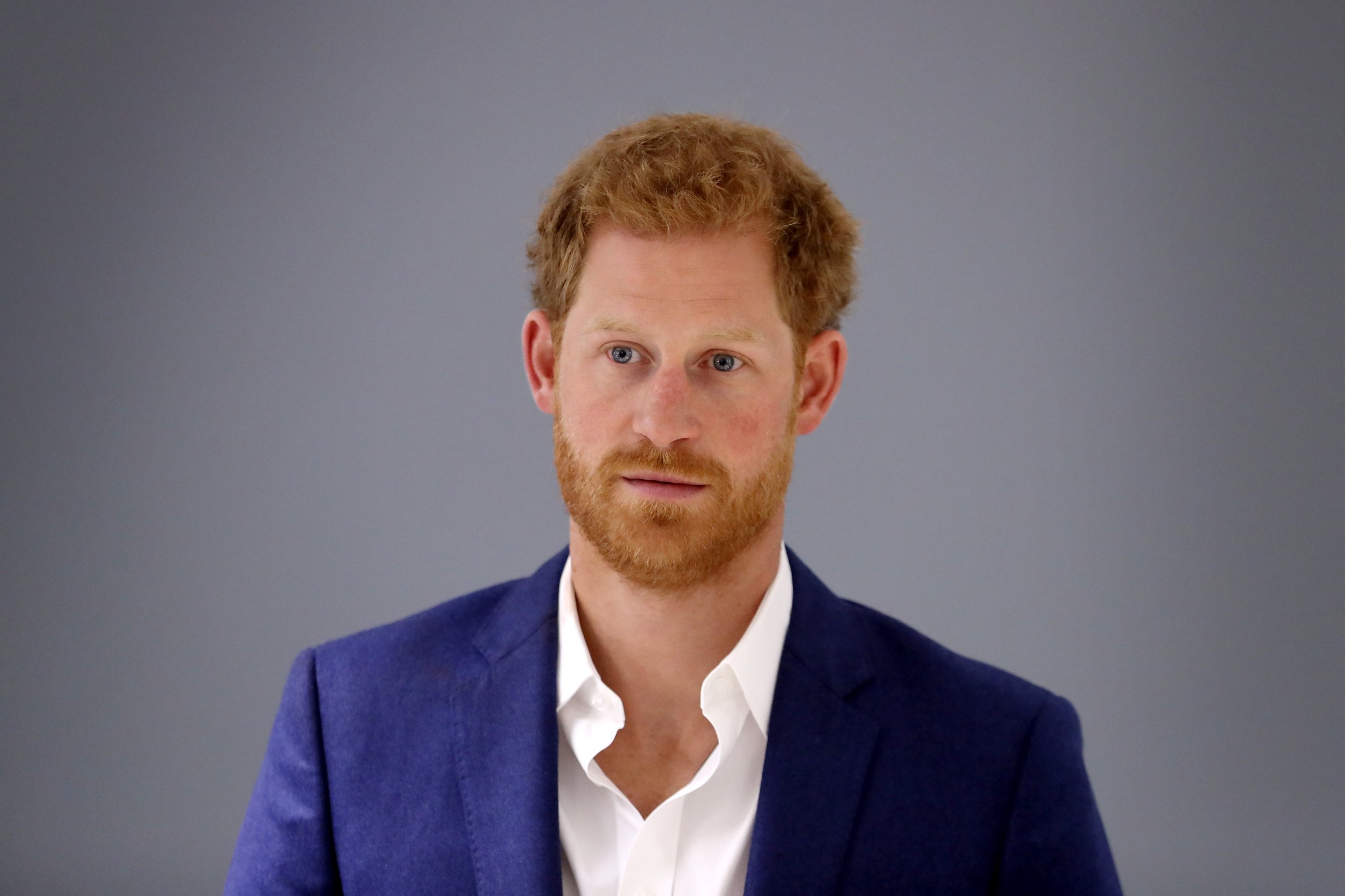 Prince Harry pictured in LA Rams locker room holding Super Bowl trophy  after watching game with Eugenie