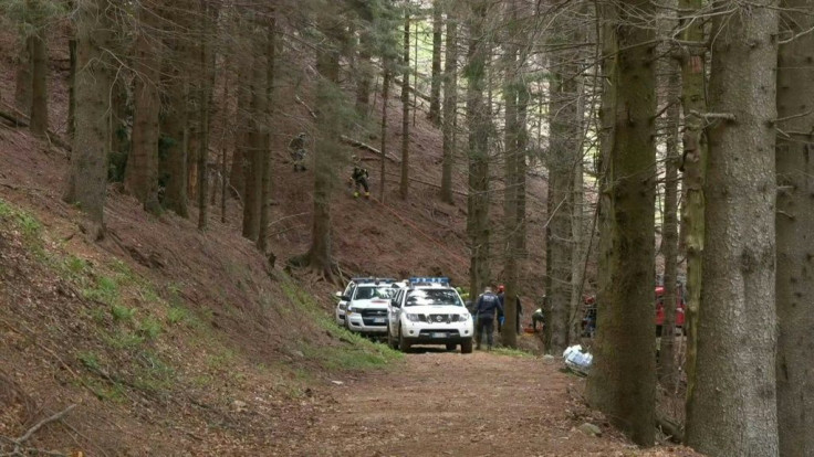 Firefighters and mountain rescue teams in northern Italy work to recover the bodies of victims