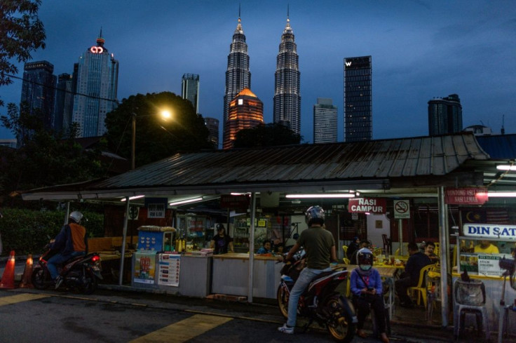 Malaysian authorities are investigating a train accident in Kuala Lumpur near the Petronas Towers that left more than 200 people injured