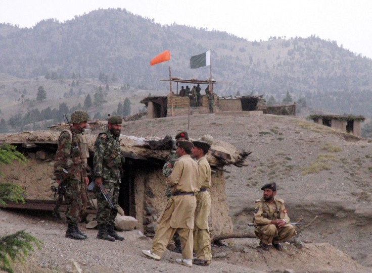 Pakistani soldiers stand near army post in Shawal mountains along Pakistan-Afghanistan border
