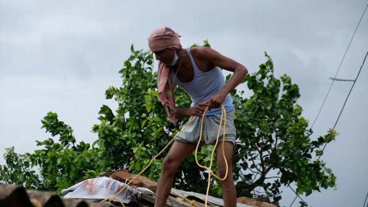 Indian residents are being evacuated and others try to protect their homes as Cyclone Yaas heads towards the Bay of Bengal, a week after another huge storm claimed at least 155 lives on the west coast.