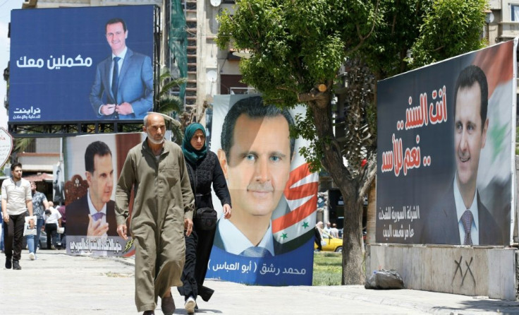 Posters promoting Assad have been plastered across areas of Syria controlled by the government